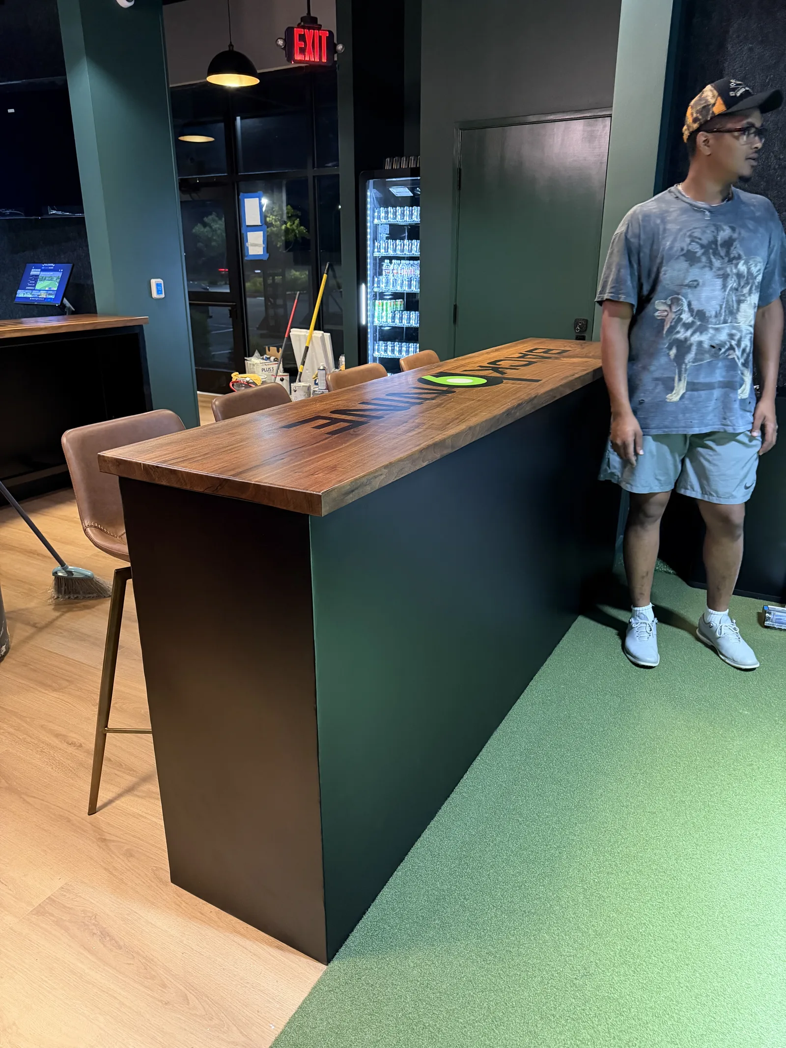 CJM custom metal table frame installed beneath a wood tabletop